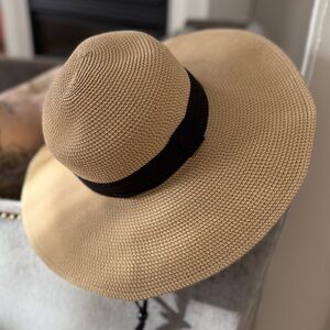 Elegant Tan Wide-Brim Hat with black trim